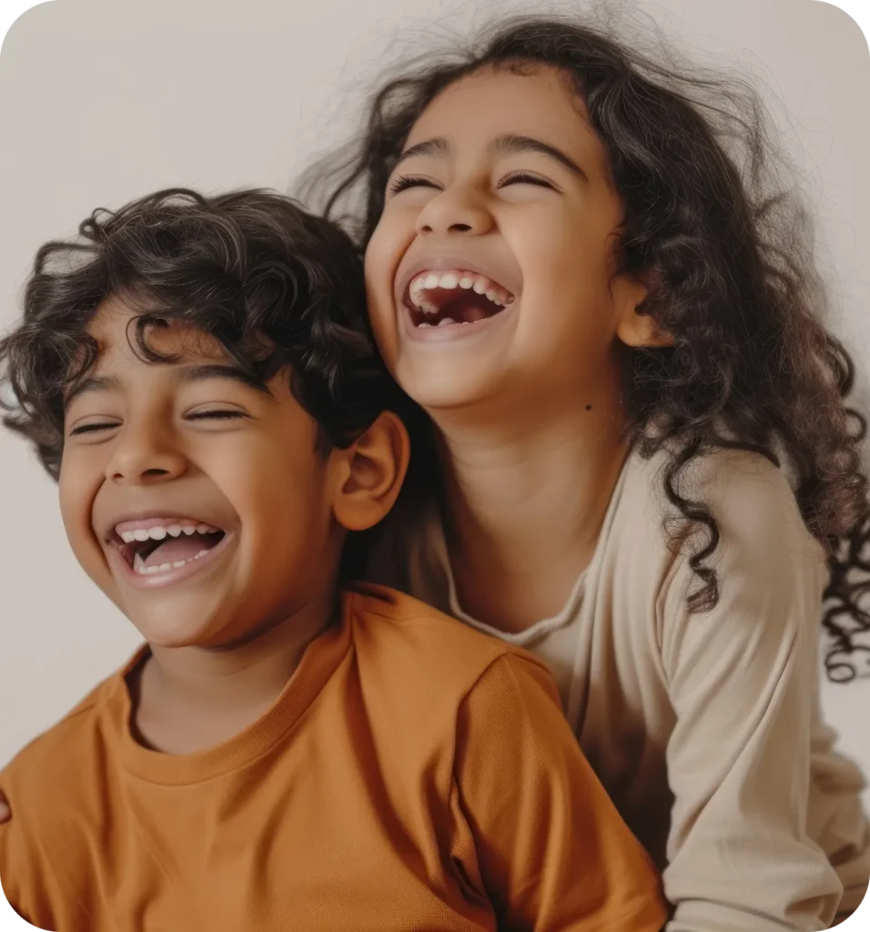 Two children are smiling
