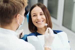 invisalign dentist consultation with female patient
